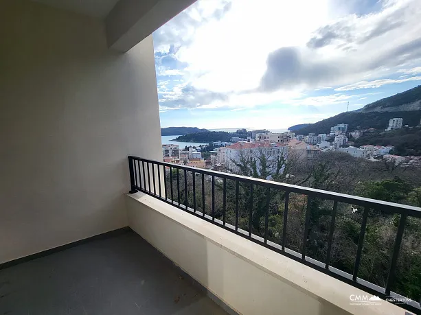 Möblierte Wohnung mit einem Schlafzimmer, Meerblick und Garagenplatz in einem neuen Gebäude