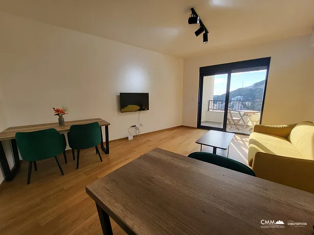 Möblierte Wohnung mit einem Schlafzimmer, Meerblick und Garagenplatz in einem neuen Gebäude