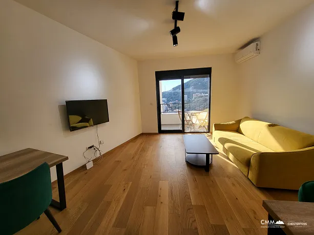 Möblierte Wohnung mit einem Schlafzimmer, Meerblick und Garagenplatz in einem neuen Gebäude