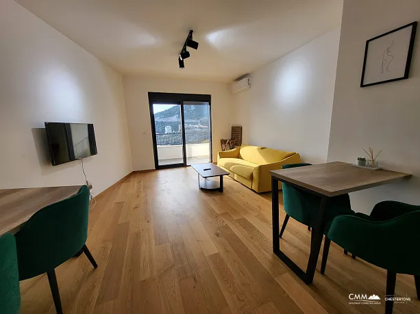 Möblierte Wohnung mit einem Schlafzimmer, Meerblick und Garagenplatz in einem neuen Gebäude