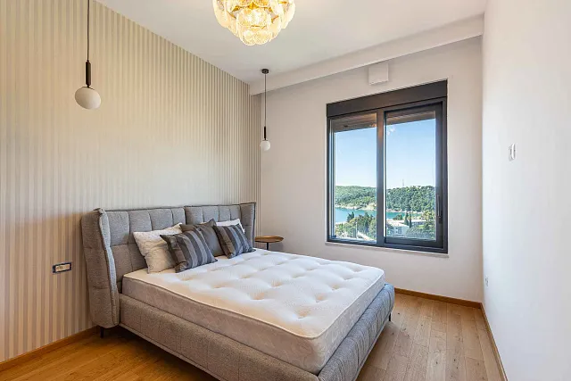 Penthouse in einem Neubau in Becici in der Nähe des Meeres — photo 17