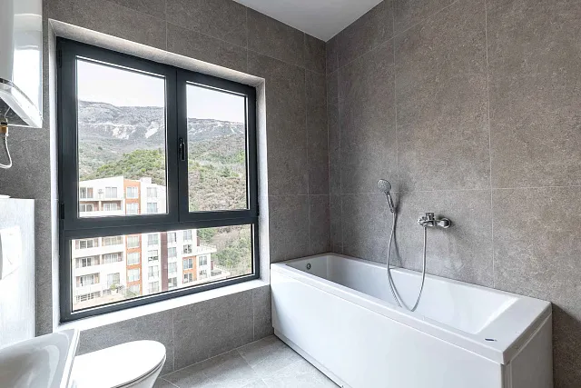 Geräumige 64 m² Wohnung in Bečići mit Meerblick — photo 14