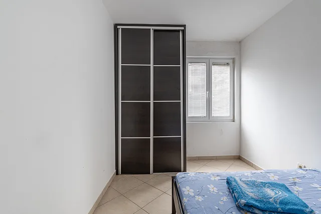 Eine 72 m² große Wohnung im Zentrum von Budva — photo 17